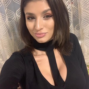 JolliT naked before webcam in live video chat