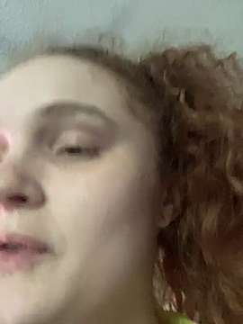 RedHeadZoe naked stripping on cam for live sex video chat